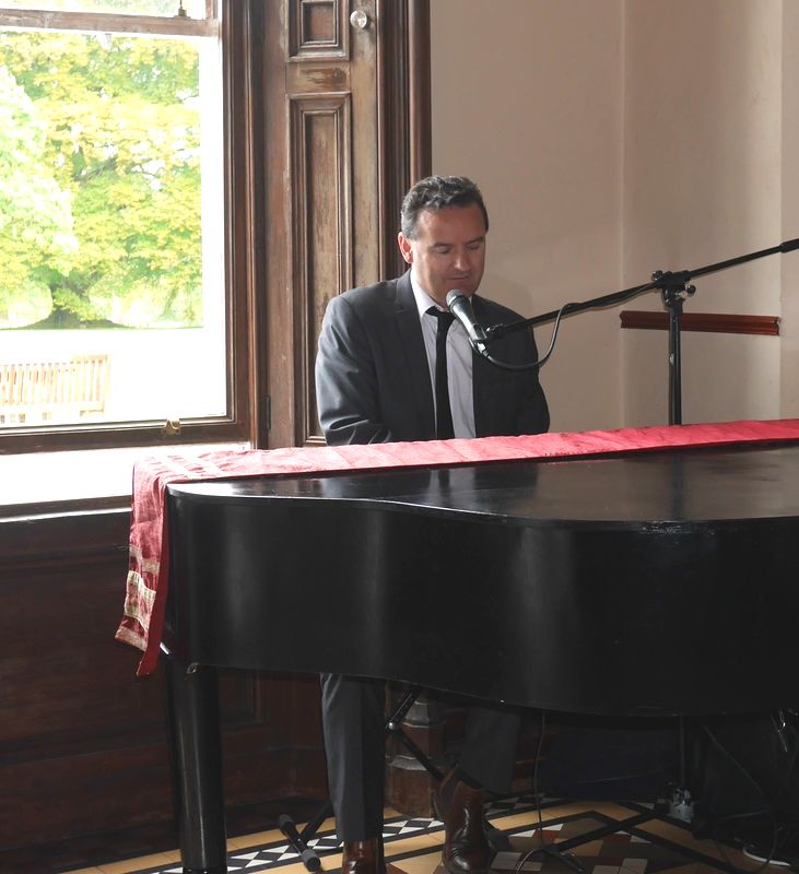 Mount Falcon Estate, sean de burca plays piano at wedding ceremony